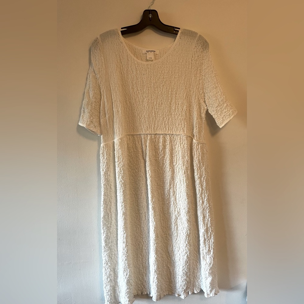 Crinkle white dress with drop waist.